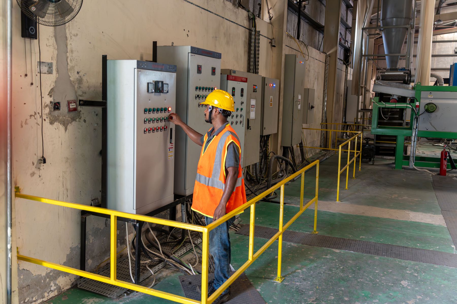 Operator in high-vis at the recovery line control panels