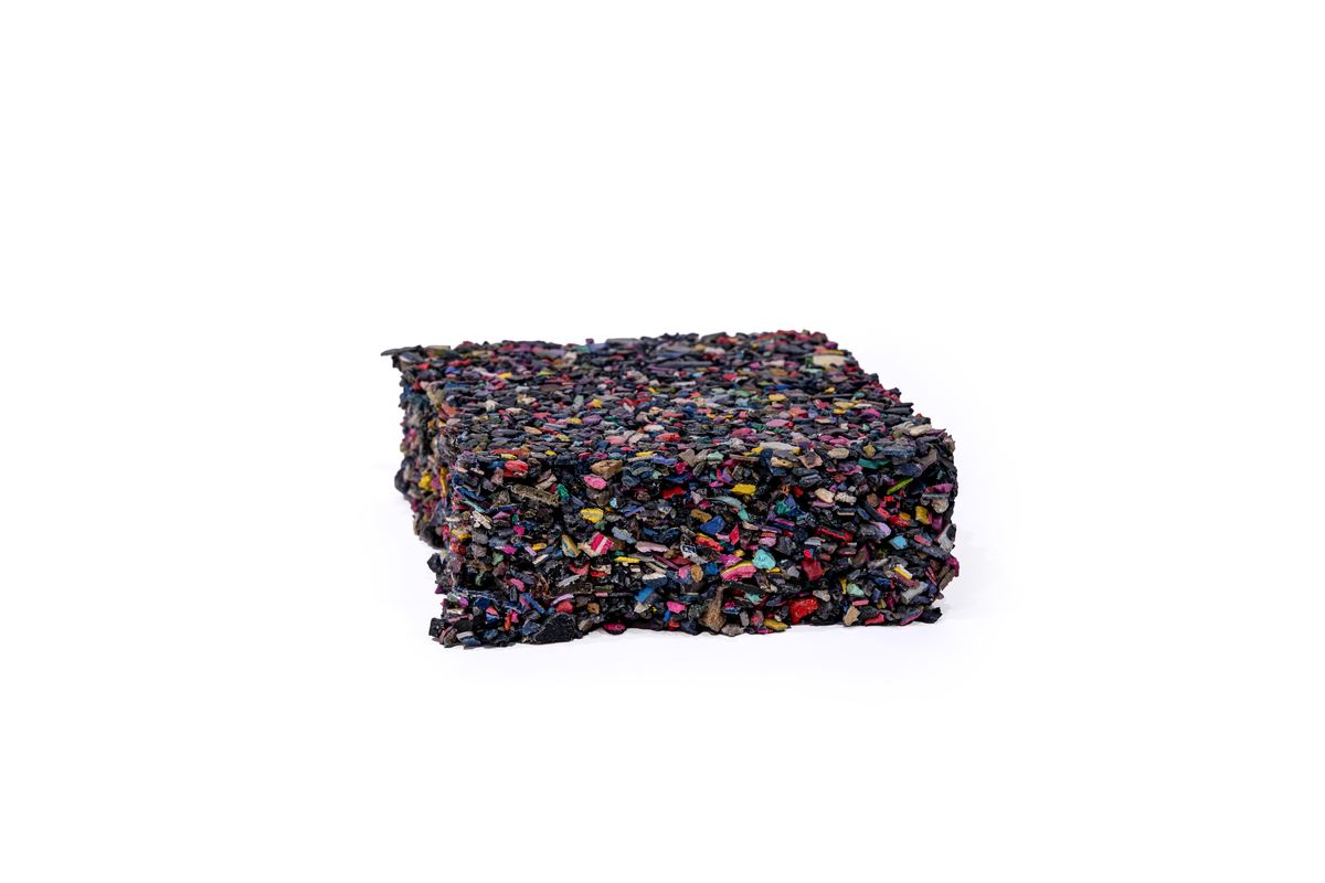 Pressed block of mixed recovered foam